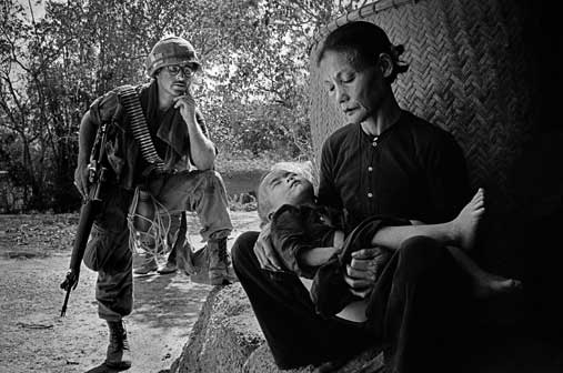 Philip Jones Griffiths, Vietnam. Quang Ngai. This was a village a few miles from My Lai. It was a routine operation - troops were on a typical " search and destroy" mission. After finding and killing men in hiding, the women